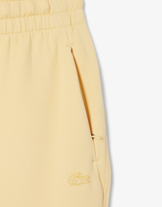 PANTALÓN BOLSILLO CREMALLERA - LACOSTE