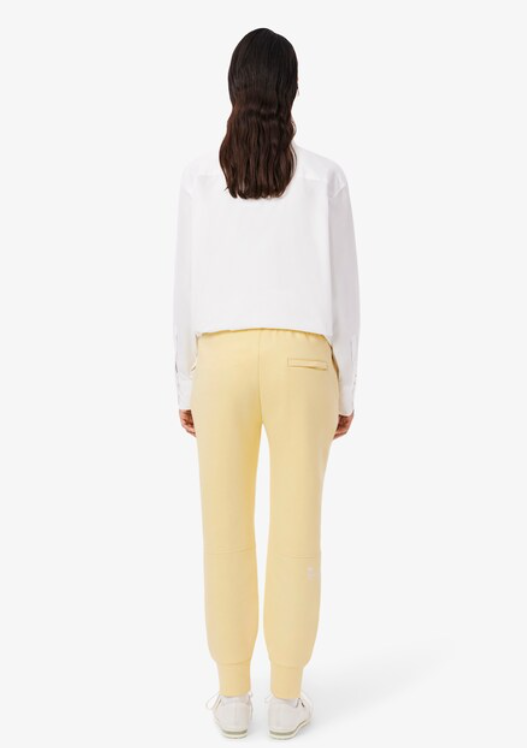 PANTALÓN BOLSILLO CREMALLERA - LACOSTE