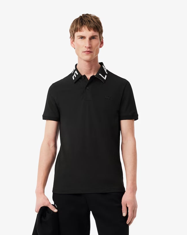 POLO CUELLO LETRAS - LACOSTE