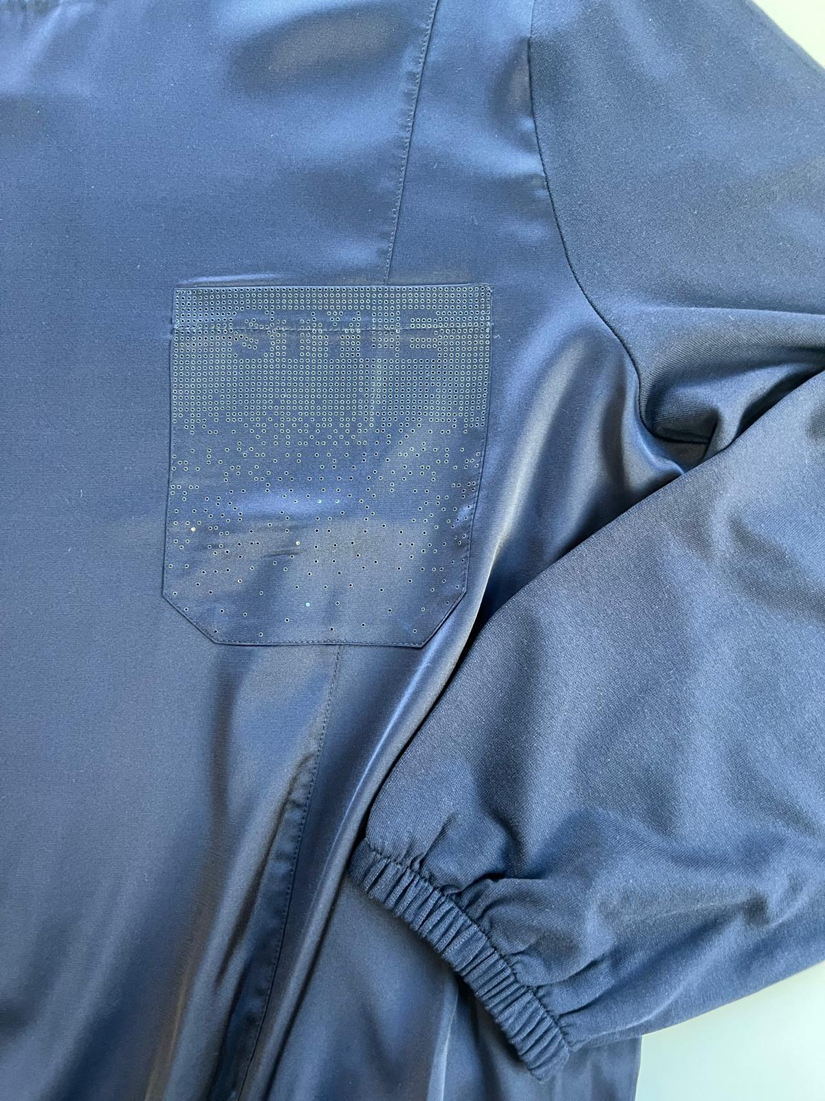 BLUSA BOLSILLO STRASS - MONARI