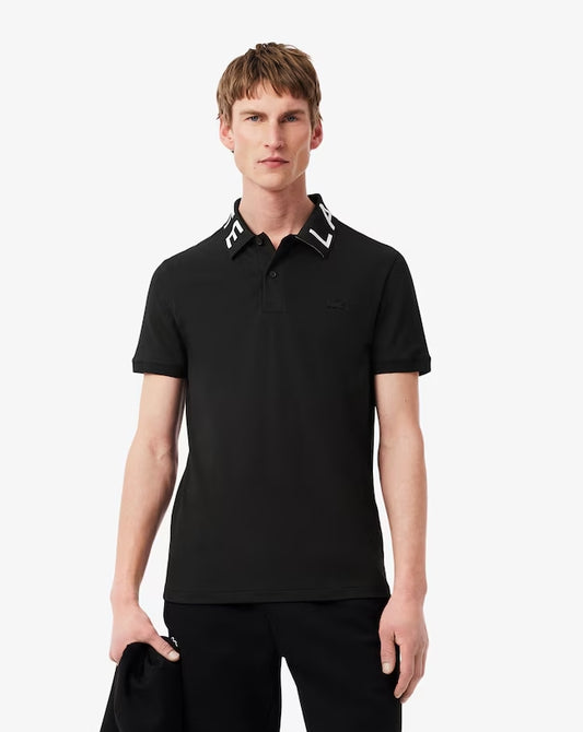 POLO CUELLO LETRAS - LACOSTE