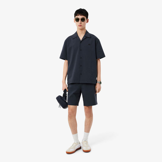 PANTALÓN CORTO RAYAS - LACOSTE