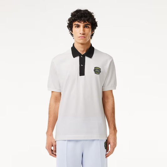 POLO BLANCO CUELLO NEGRO - LACOSTE